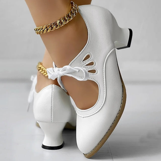 Veralyn - Vintage Schnürpumps mit Kitten-Heel